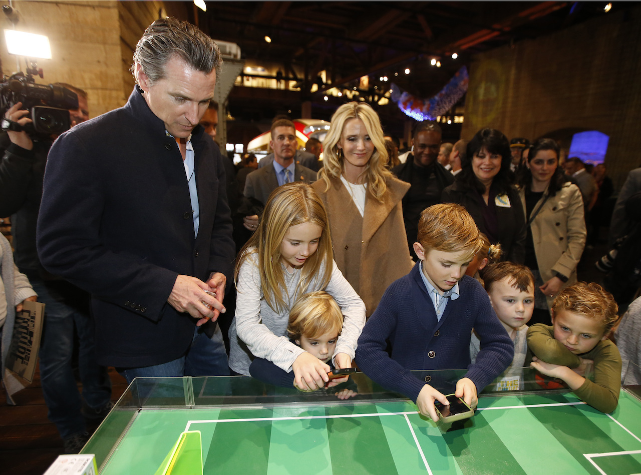 photo of gavin newsom with his family