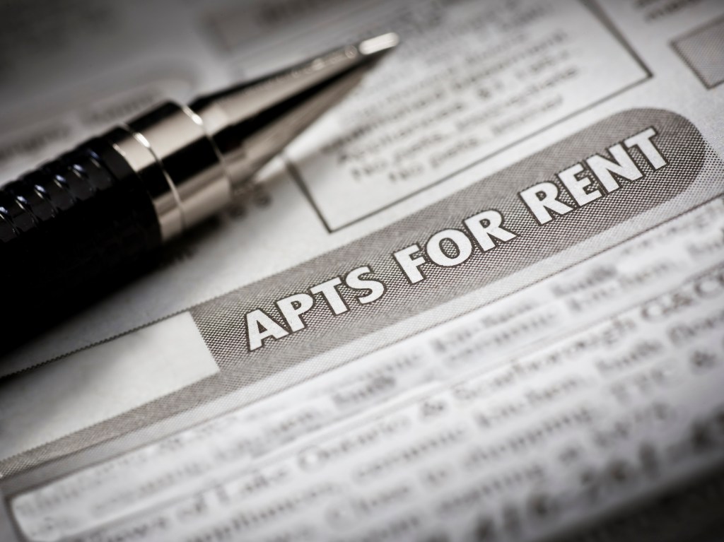 Real estate market ad in the newspaper