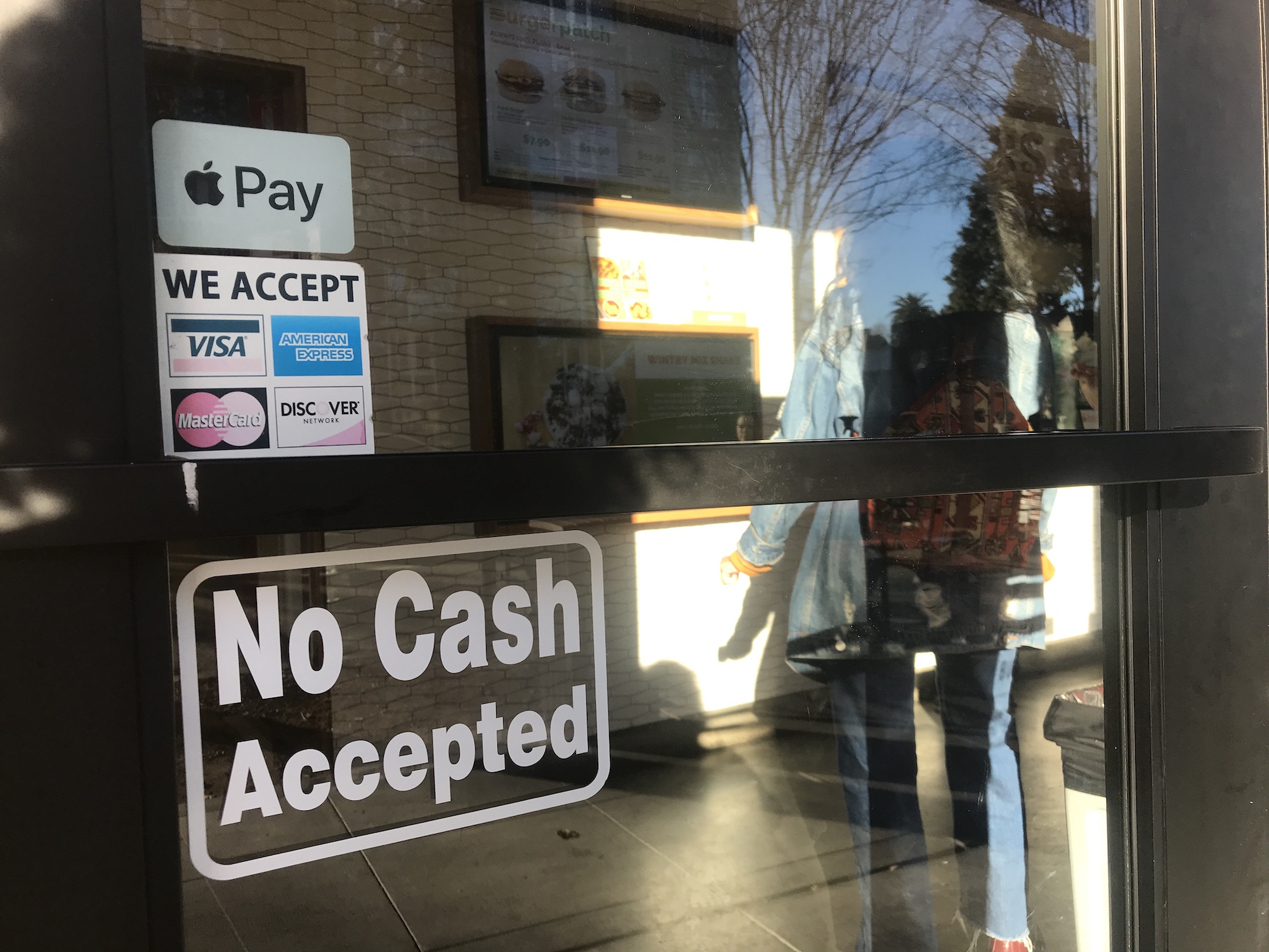 Many low-income Californians don’t use credit cards. Should stores be required to accept cash?