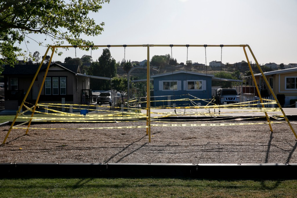 A taped-off swing set at Fairgrounds mobile home park in American Canyon on May 6, 2020. Photo by Anne Wernikoff for CalMatters