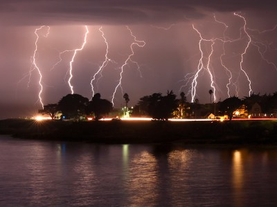 A rare lightning storm crackles over Mitchell's Cove in Santa Cruz around 3 a.m. August 16, 2020. The severe storm system rolled through the San Francisco and Monterey Bay areas early Sunday, packing a combination of dry lightning and high winds that triggered wildfires throughout the region. The National Weather Service on Sunday extended a red flag fire warning for the entire Bay Area until 11 a.m. Monday morning. Photo by Shmuel Thaler, The Santa Cruz Sentinel via AP