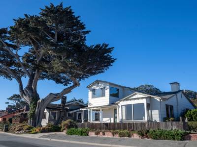 A for sale sign hangs in front of a home in Pacific Grove, on Friday, Nov. 27, 2020. Photo David Rodriguez, The Salinas Californian