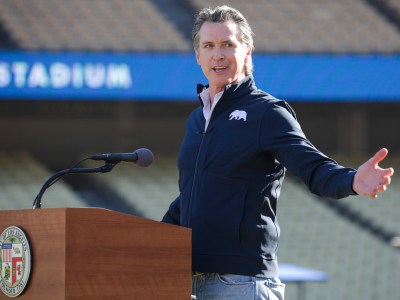 Governor Gavin Newsom addresses a press conference held at the launch of a mass COVID-19 vaccination site at Dodger Stadium in Los Angeles on Jan. 15, 2021. Photo by Irfan Khan, Los Angeles Times via AP/Pool