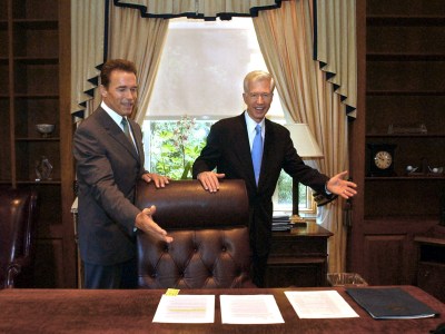 Gov.-elect Arnold Schwarzenegger, left, and Gov. Gray Davis joke with each other as Davis shows Schwarzenegger the governor's private office at the Capitol in Sacramento on Oct. 23, 2003. The two met for the first time since the election to go discuss the transition. Photo by . Rich Pedroncelli, AP Photo