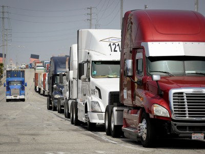 Semi-trucks line up near Pier J to retrieve shipping containers at the Port of Long Beach on April 4, 2018. Photo by Bob Riha Jr., REUTERS