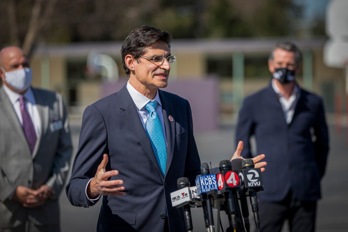 State Sen. Josh Becker, D-Menlo Park, speaks to media about reopening schools at Barron Park Elementary in Palo Alto on March 2, 2021. Photo by Magali Gauthier/Palo Alto Online