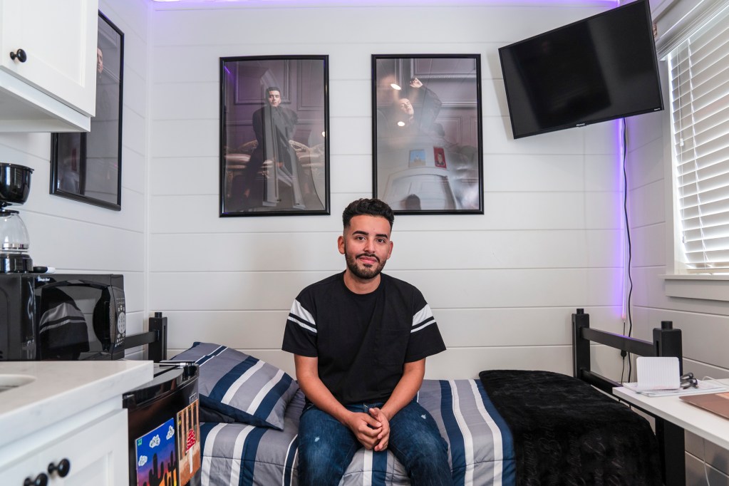 Jorge Chavez sits in his room at Lotus Living in El Centro on Jan. 22, 2023. Photo by Ariana Drehsler for CalMatters