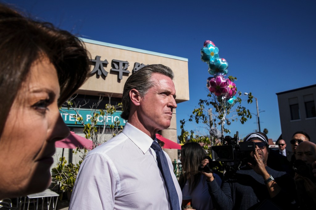 Gov. Gavin Newsom visits businesses across the street from where a mass shooting took place in Monterey Park on Jan. 23, 2023. Pablo Unzueta for CalMatters