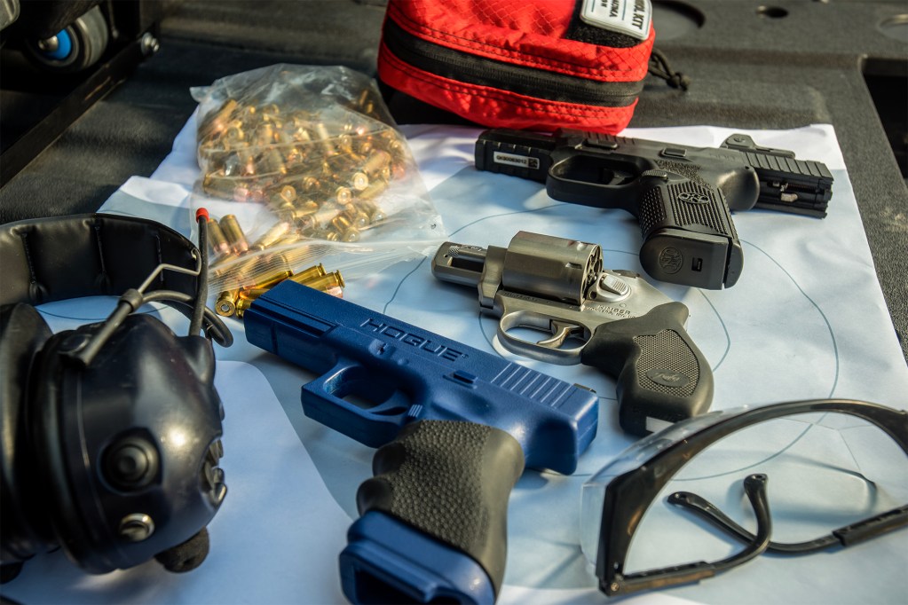 A series of firearms and ammunition owned by firearms instructor Ziyad "Zip" Showket. March 15, 2023. Photo by Mark Leong for CalMatters