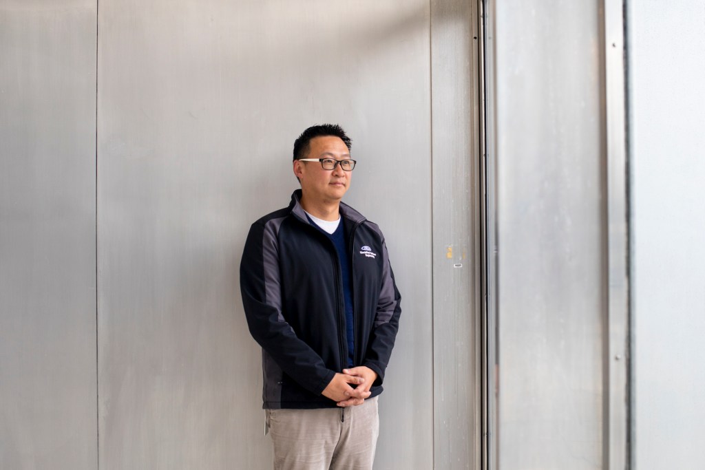 Charles Poon, Director of Electrified Systems Engineering for Ford at the Ford headquarters in Dearborn, Michigan on April 5, 2023.. Photo by Emily Elconin for CalMatters
