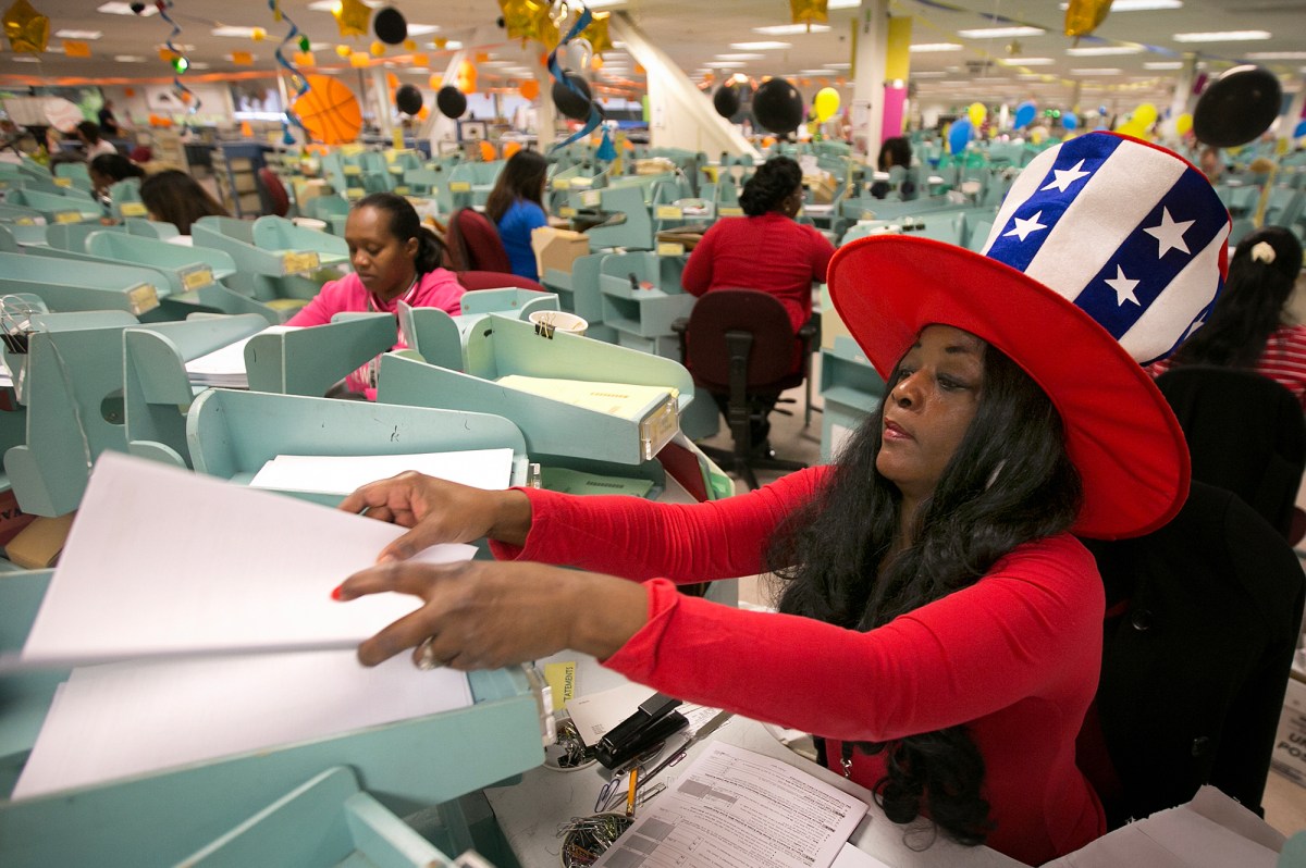 Workers sort California income tax returns at the Franchise Tax Board office in Sacramento on April 18, 2017. Photo by Rich Pedroncelli, AP Photo