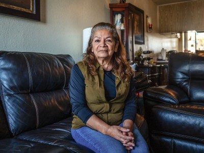 Gladys Balcazar in her apartment in Imperial Beach on April 18, 2023. Balcazar, who puts 83% of her income toward rent, is a single mom living with her son who has a disability. Photo by Ariana Drehsler for CalMatters