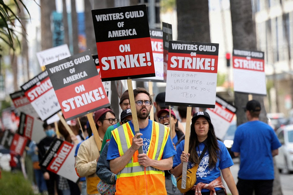 Writers Guild of America members and supporters picket outside Sunset Bronson Studios and Netflix Studios, after union negotiators called a strike for film and television writers, in Los Angeles on May 3, 2023. Photo by Mario Anzuoni, Reuters