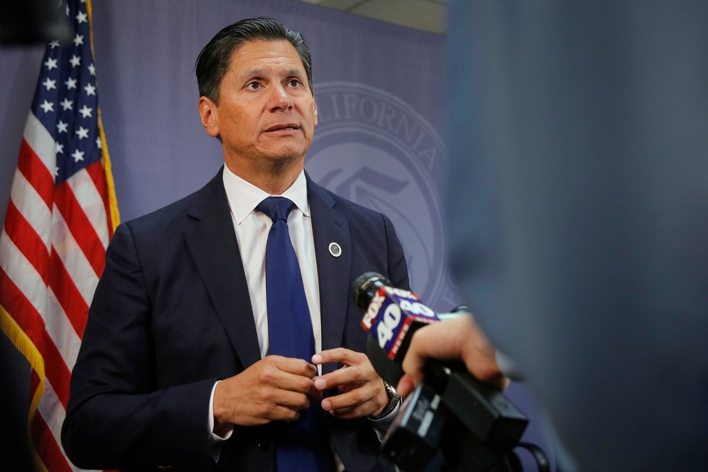 Eloy Ortiz Oakley speaks with reporters after he was named chancellor of the California Community Colleges in 2016. AP Photo/Rich Pedroncelli