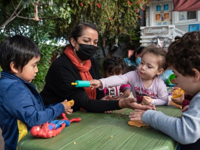 Patricia Moran watches children enrolled at her at-home daycare in San Jose on Nov. 2nd, 2022. Photo by Laure Andrillon for CalMatters