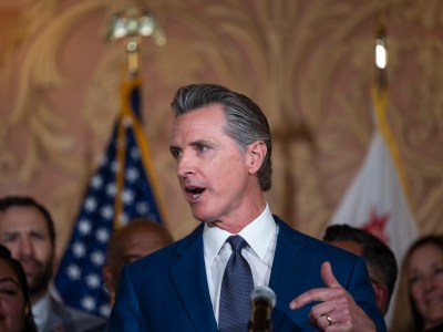 Gov. Gavin Newsom speaks at the Capitol before signing into law his oil profit penalty plan in Sacramento on March 28, 2023. Photo by Miguel Gutierrez Jr. , CalMatters