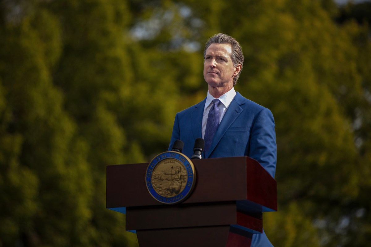Gov. Gavin Newsom addresses attendees during his inauguration for a second term at the Plaza de California in Sacramento on Jan. 6, 2023. Photo by Rahul Lal, CalMatters
