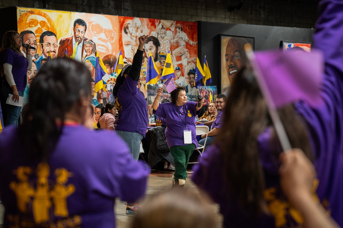 An interactive segment with crowd participation at the California Fast Food Workers Union SEIU Membership Launch Event in Los Angeles on Feb. 9, 2024. Photo by Jules Hotz for CalMatters