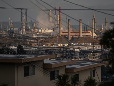 The Chevron refinery in Richmond is located behind a neighborhood on Feb. 21, 2024. Photo by Loren Elliott for CalMatters