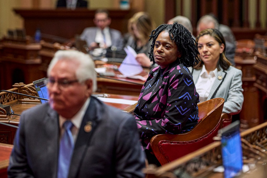 State Senator Lola Smallwood-Cuevas listens to another lawmaker speaking on the first day of session in the California Senate on Jan. 3, 2024. Photo by Fred Greaves for CalMatters