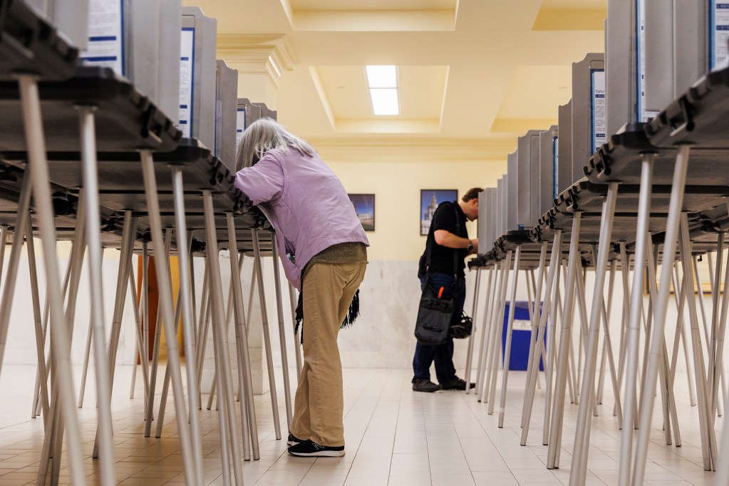 Voters cast their ballots at San Francisco City Hall on March 5, 2024. Photo by Juliana Yamada for CalMatters