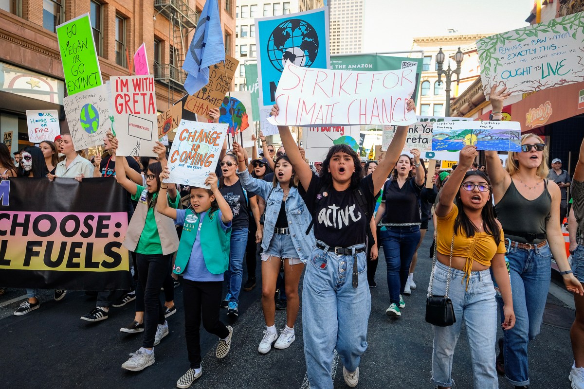 Climate activists participate in a student-led climate change march in Los Angeles in 2019. Photo by Ringo H.W. Chiu, AP Photo