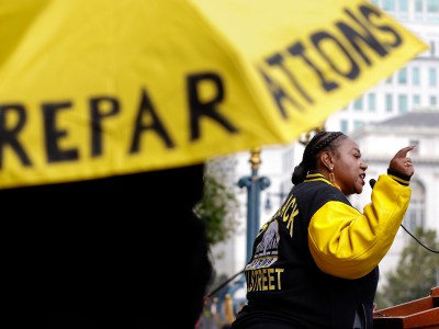 Tinisch Hollins, vice chair of the African American Reparations Advisory Committee, speaks to attendees at a rally in support of reparations in San Francisco in 2023. Photo by Lea Suzuki, San Francisco Chronicle via AP Photo