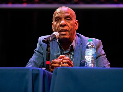 State Sen. Steven Bradford speaks during a Q-and-A session at the State of Black California Tour at Crawford High School in San Diego on June 15, 2024. Photo by Kristian Carreon for CalMatters